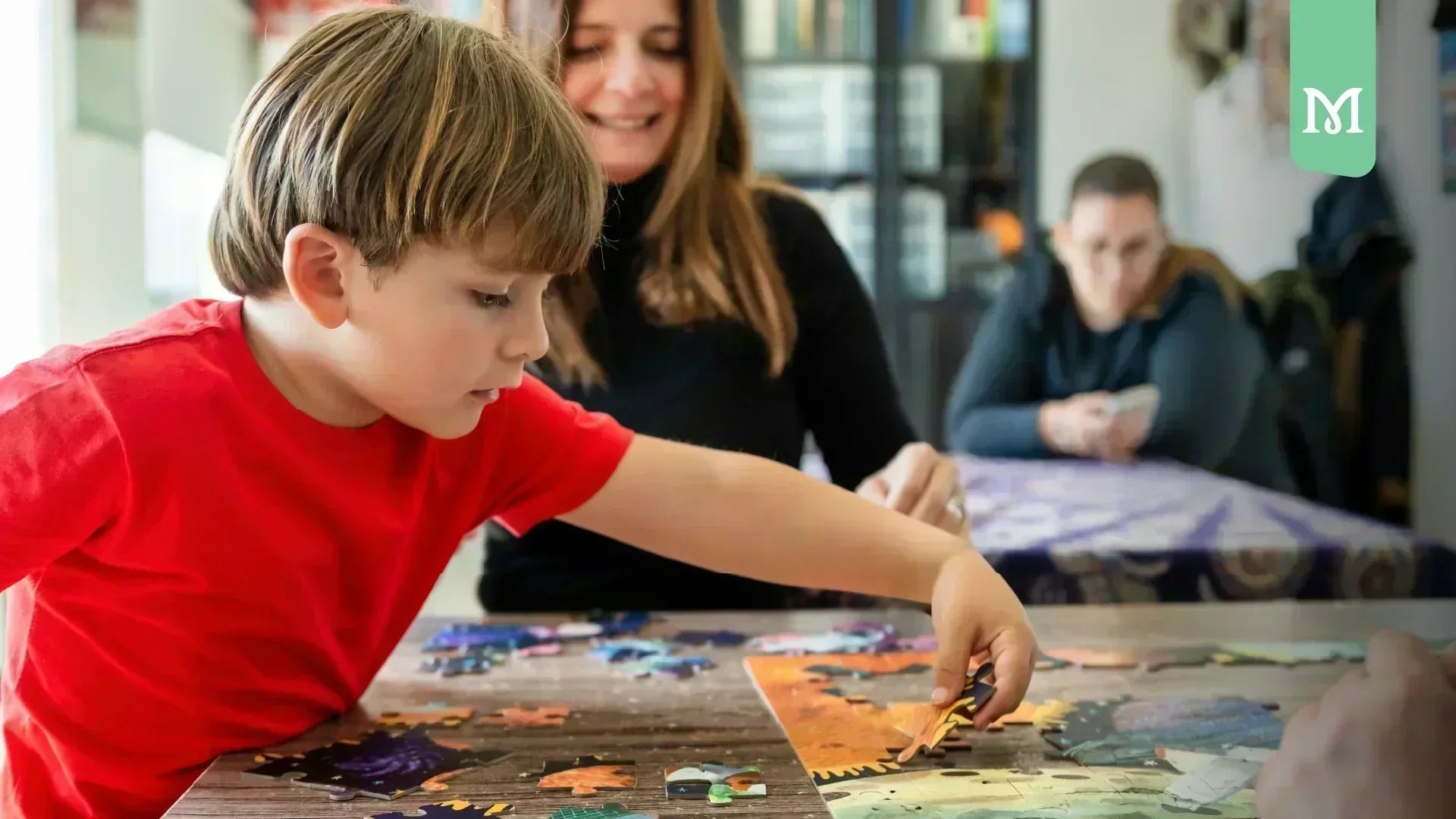 kid playing with a puzzle
