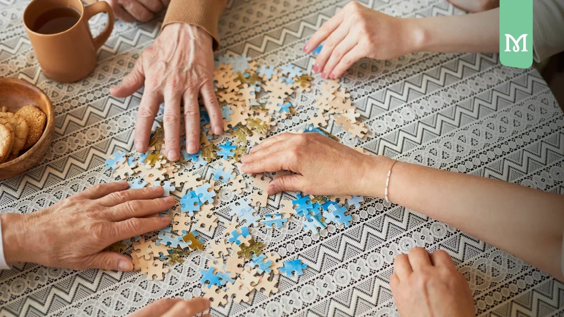 hands making a puzzle together