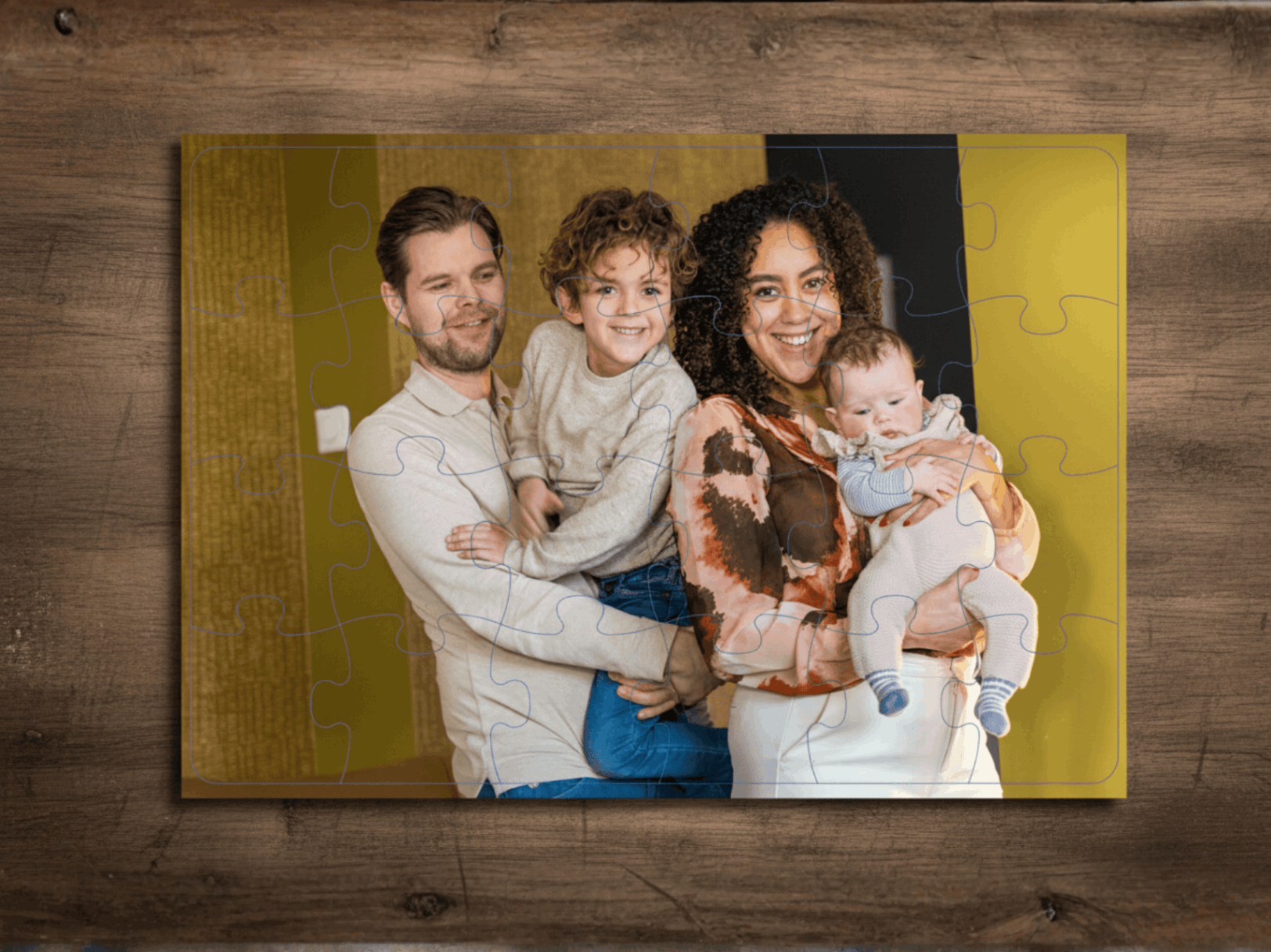 Family photo puzzle on a wooden surface